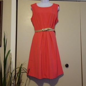 Coral/orange dress with cream belt